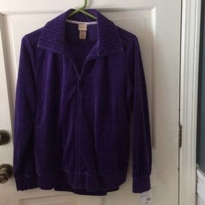 Two piece velour track suit.